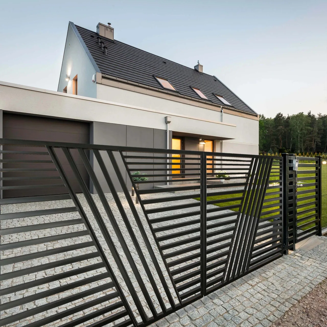 Pedestrian gate on a sloped path