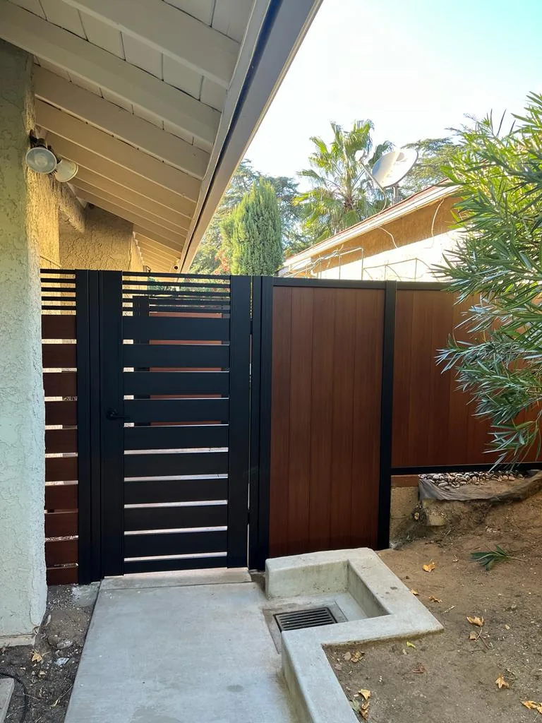 Vinyl walk gate in a white fence