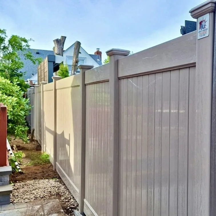 White vinyl fence with a matching walk gate