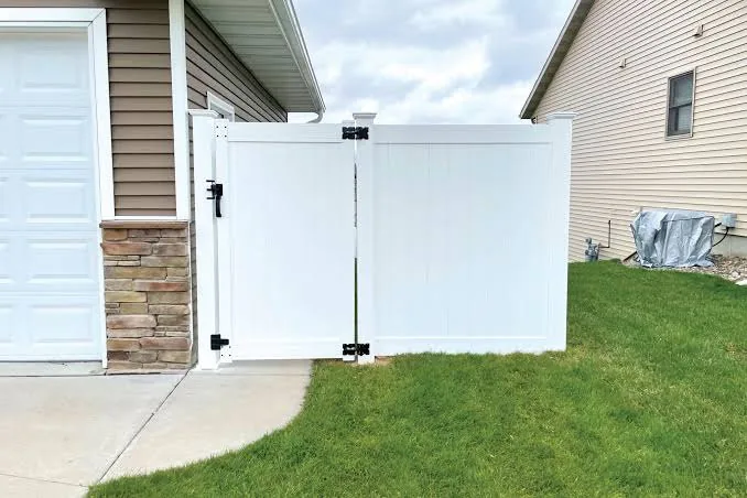 White PVC fence and gate installation