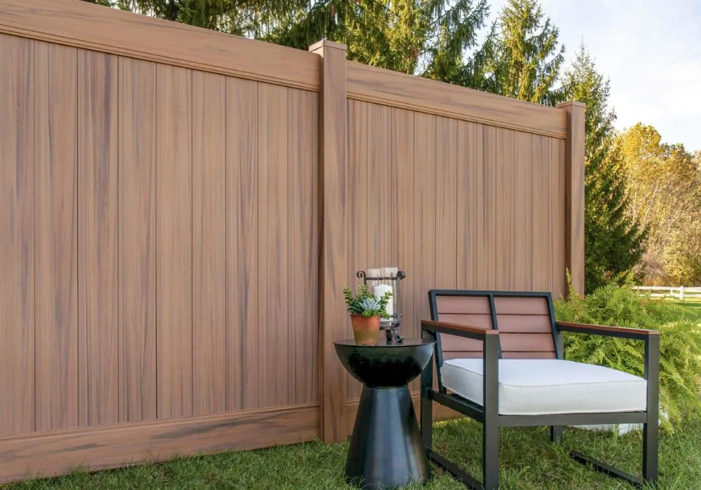 Finished vinyl fence run with reinforced rails