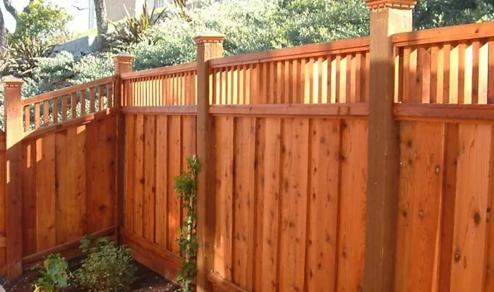 Wood picket fence to a front garden